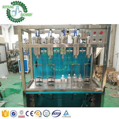 Semi Auto 500B/H to 1000BPH 650ml Aluminum Bottle Ca P 2 4 Head Nozzle Carbonated Drink Filling Machine